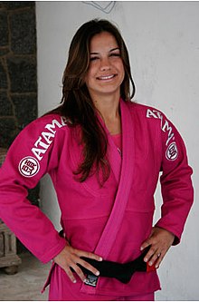 Female BJJ athlete Kyra Gracie in a pink Atama BJJ gi