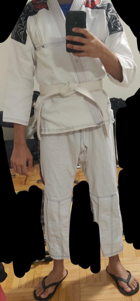 Picture of someon in a BJJ gi that's much too small